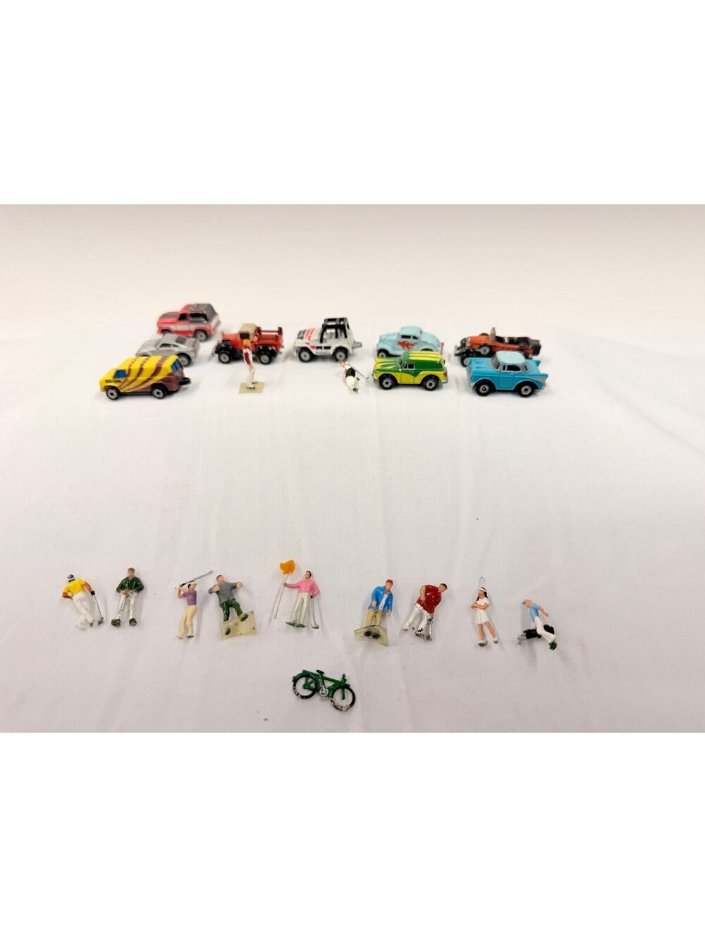 Lot of micro machines and small people toys